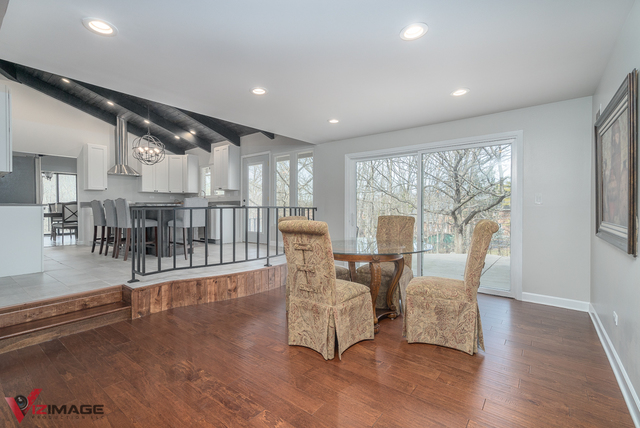 44 Old Creek Road Palos Park, IL 60464 - Photo 7 of 38 a dining room with furniture wooden floor and a rug