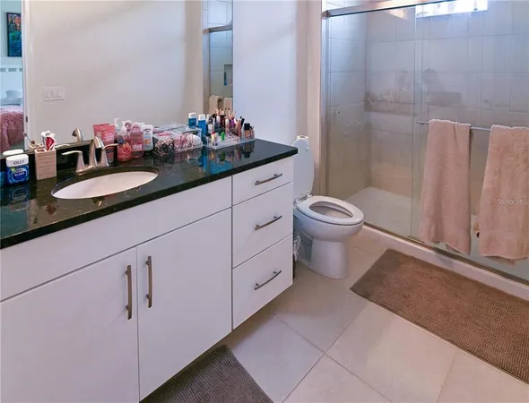 a view of a balcony with wooden floor