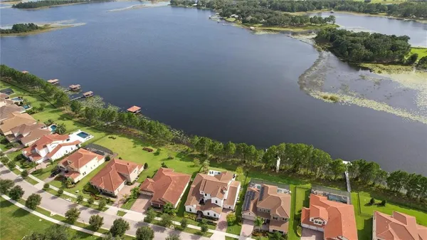 a view of a street with a lake view