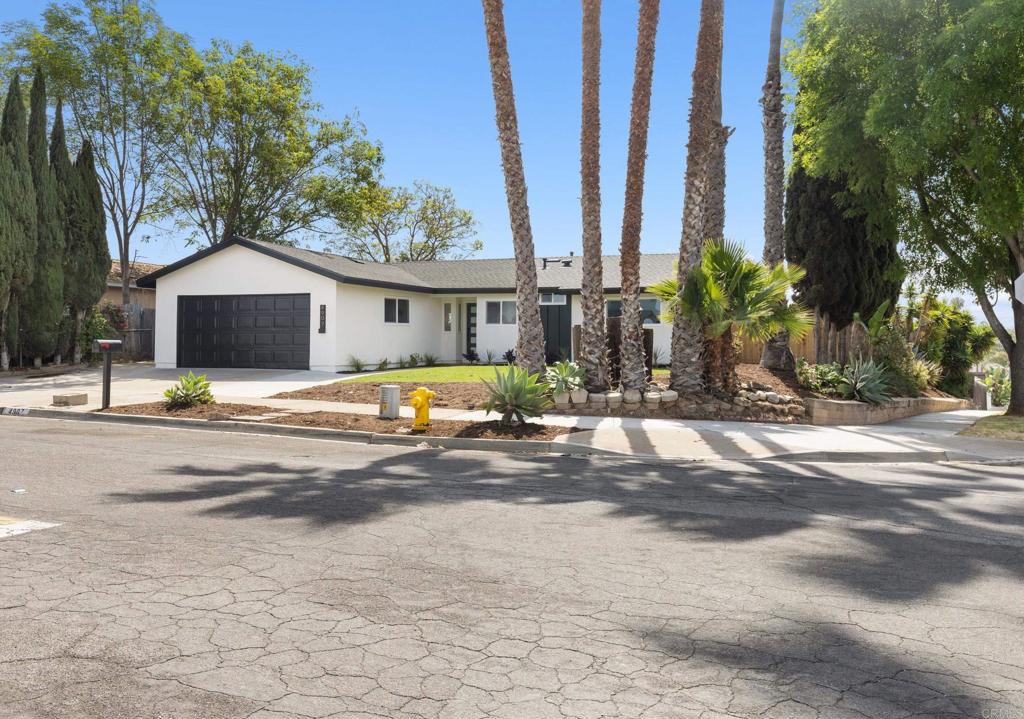 4907 Stephanie Place Oceanside, CA 92057 - Photo 24 of 24 a view of a house with a yard