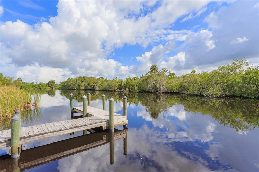 Butch Cassidy Trail Wimauma, FL 33598 - Photo 11 of 22 a view of a lake with a outdoor space