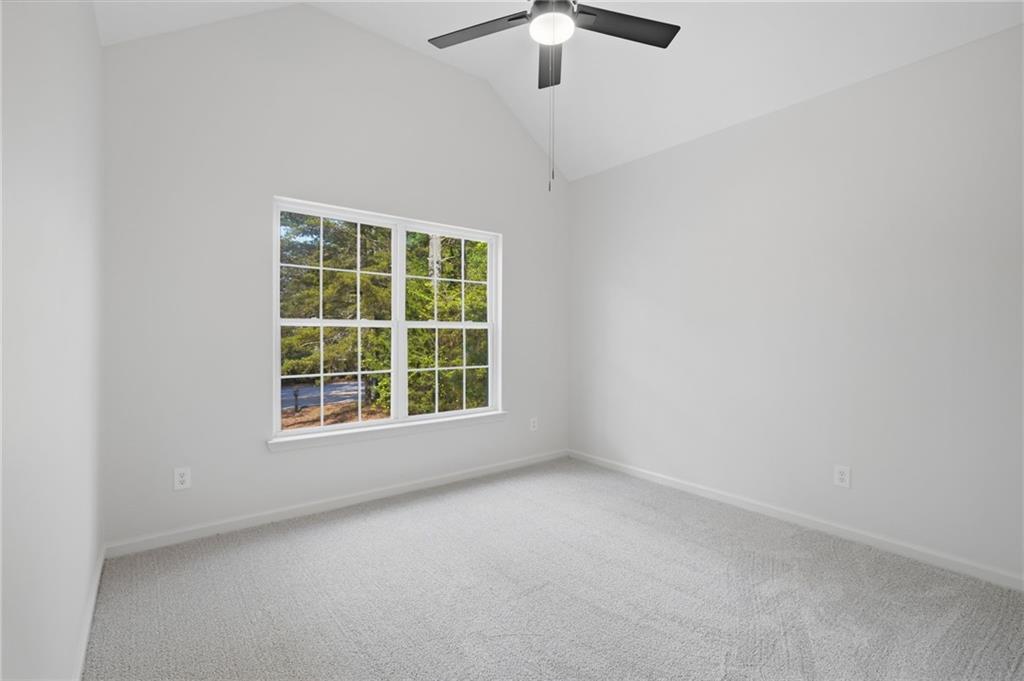 9485 Waldrip Road Gainesville, GA 30506 - Photo 17 of 30 an empty room with a window