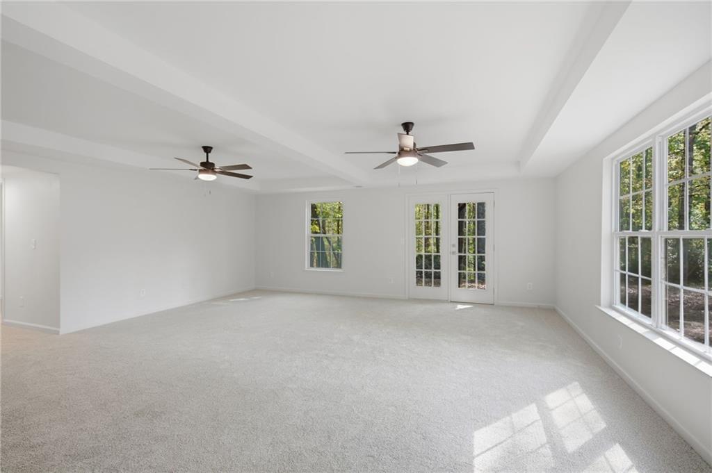 9485 Waldrip Road Gainesville, GA 30506 - Photo 19 of 30 a view of an empty room with a window