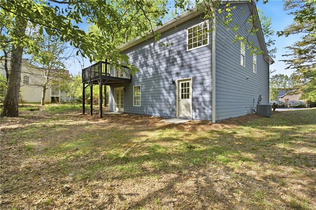 9485 Waldrip Road Gainesville, GA 30506 - Photo 26 of 30 a view of a house with a yard