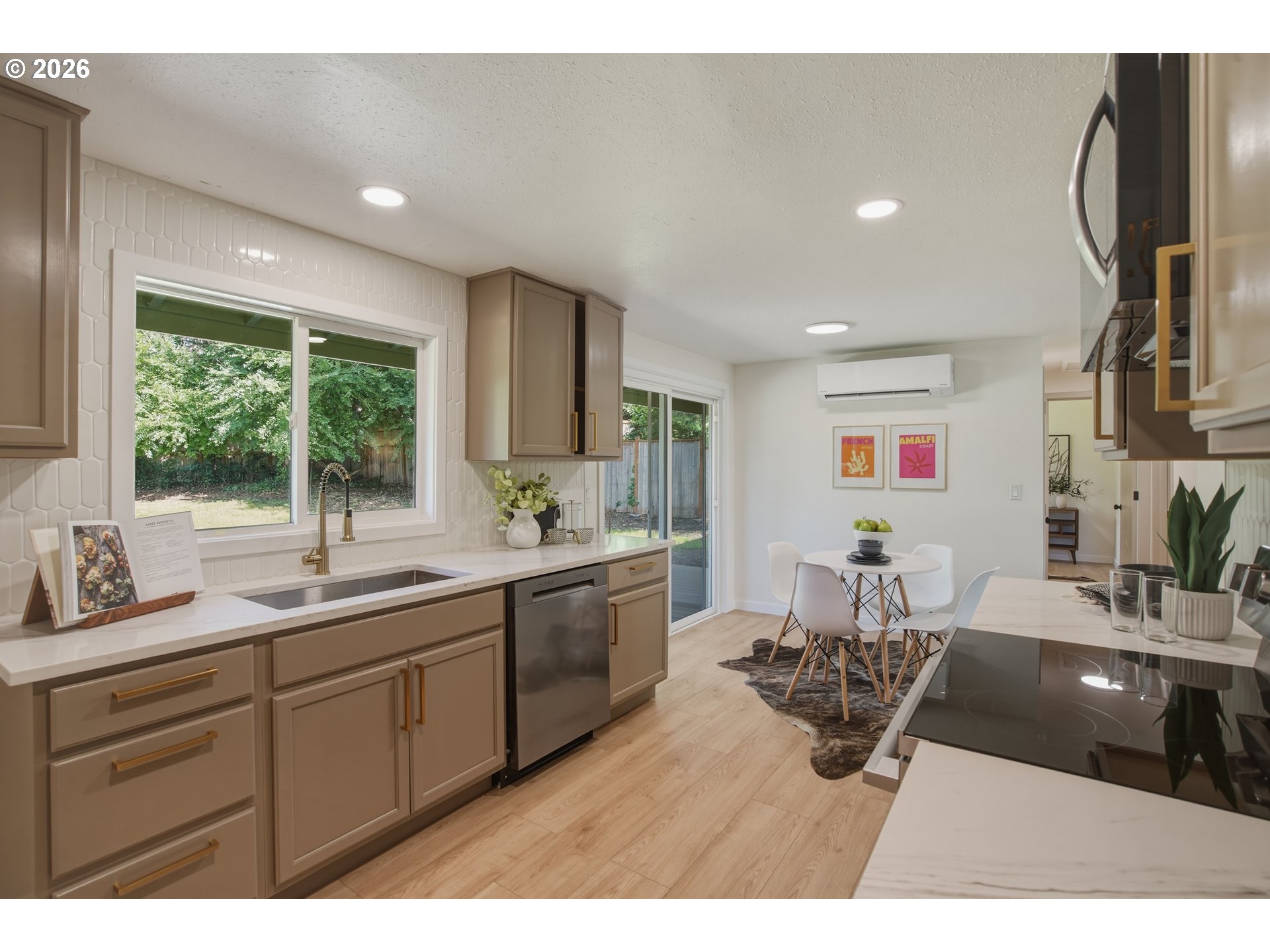3455 Potter Street Eugene, OR 97405 - Photo 19 of 36 a kitchen with a sink appliances and a counter top space