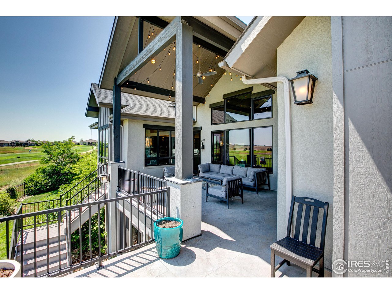 6438 Sanctuary Drive Windsor, CO 80550 - Photo 35 of 40 a view of balcony with furniture