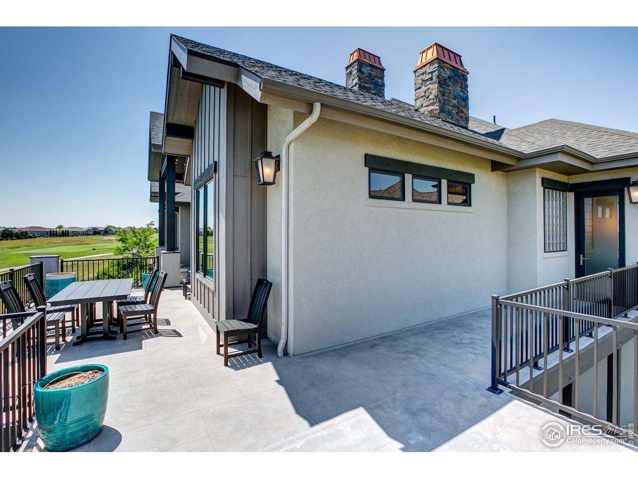 6438 Sanctuary Drive Windsor, CO 80550 - Photo 37 of 40 a view of a house with backyard and sitting area
