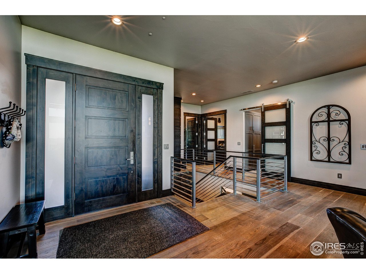 6438 Sanctuary Drive Windsor, CO 80550 - Photo 4 of 40 a living room with furniture