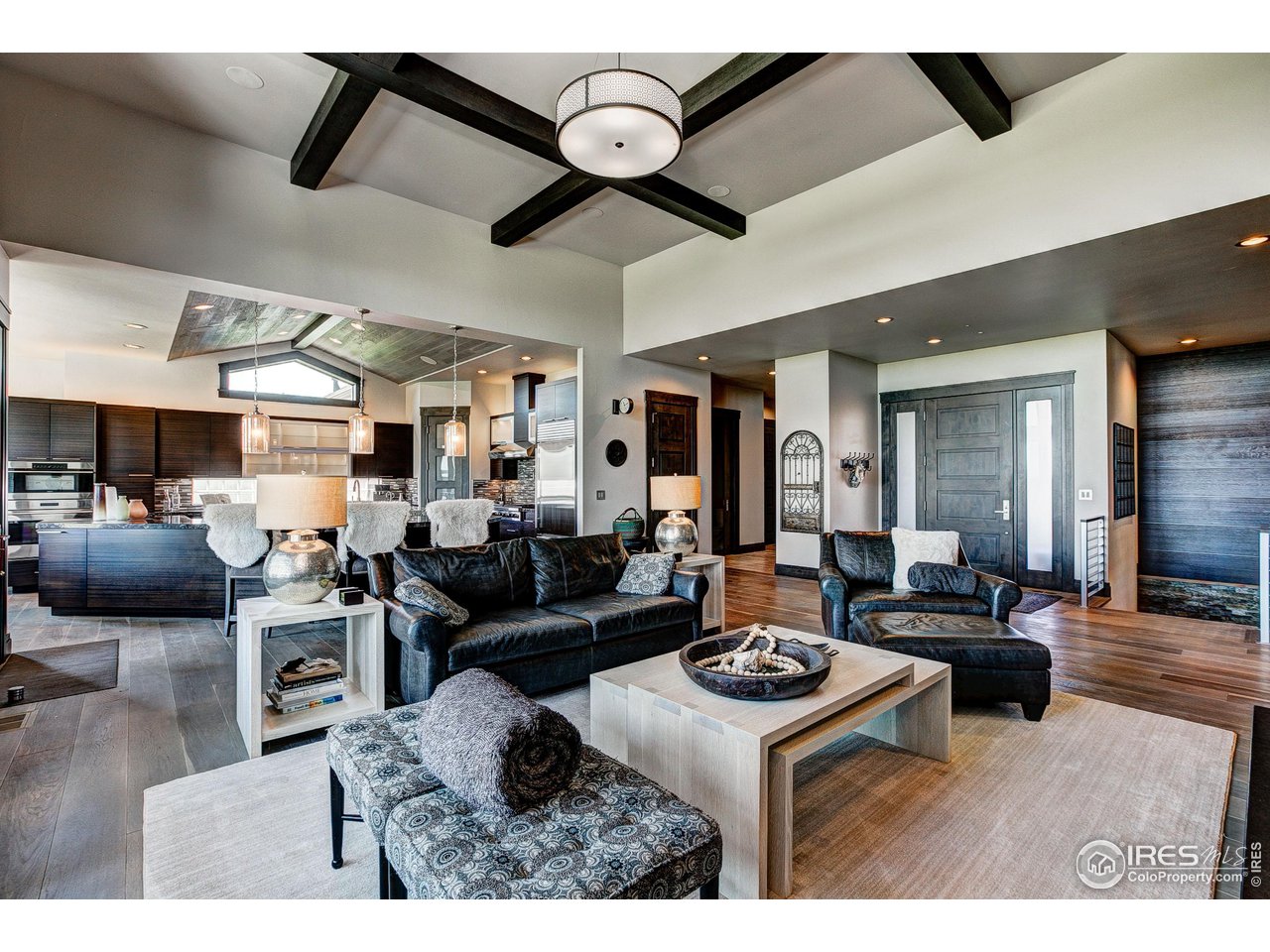 6438 Sanctuary Drive Windsor, CO 80550 - Photo 7 of 40 a living room with furniture and a large window