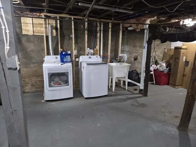 a view of a storage room with washer and dryer