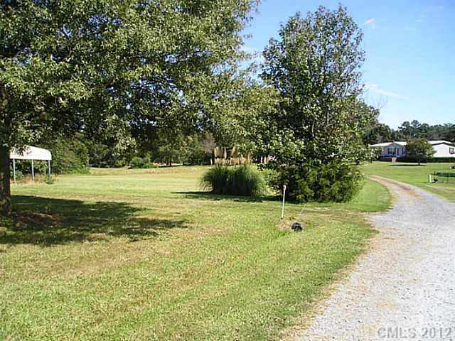 0 Clontz Long Road Monroe, NC 28110 - Photo 2 of 5 a view of a park with large trees