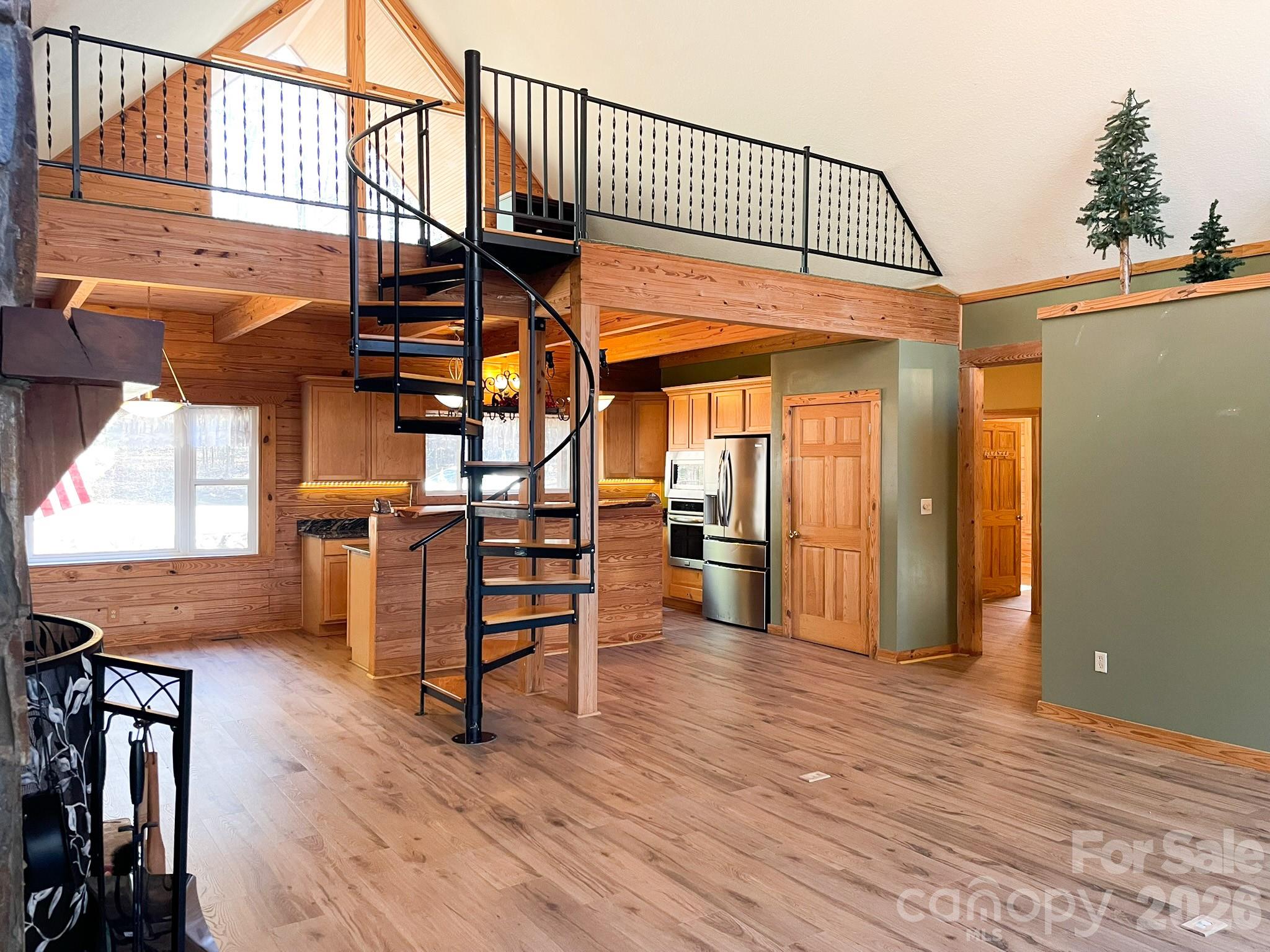 143 Rosewood Lane Rutherfordton, NC 28139 - Photo 11 of 42 a view of entryway and hall with wooden floor