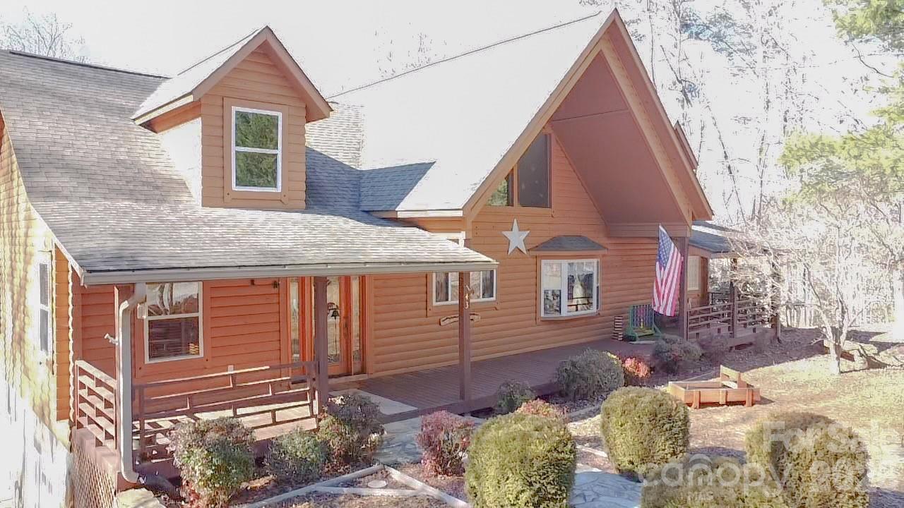 143 Rosewood Lane Rutherfordton, NC 28139 - Photo 2 of 42 a view of a house with a yard