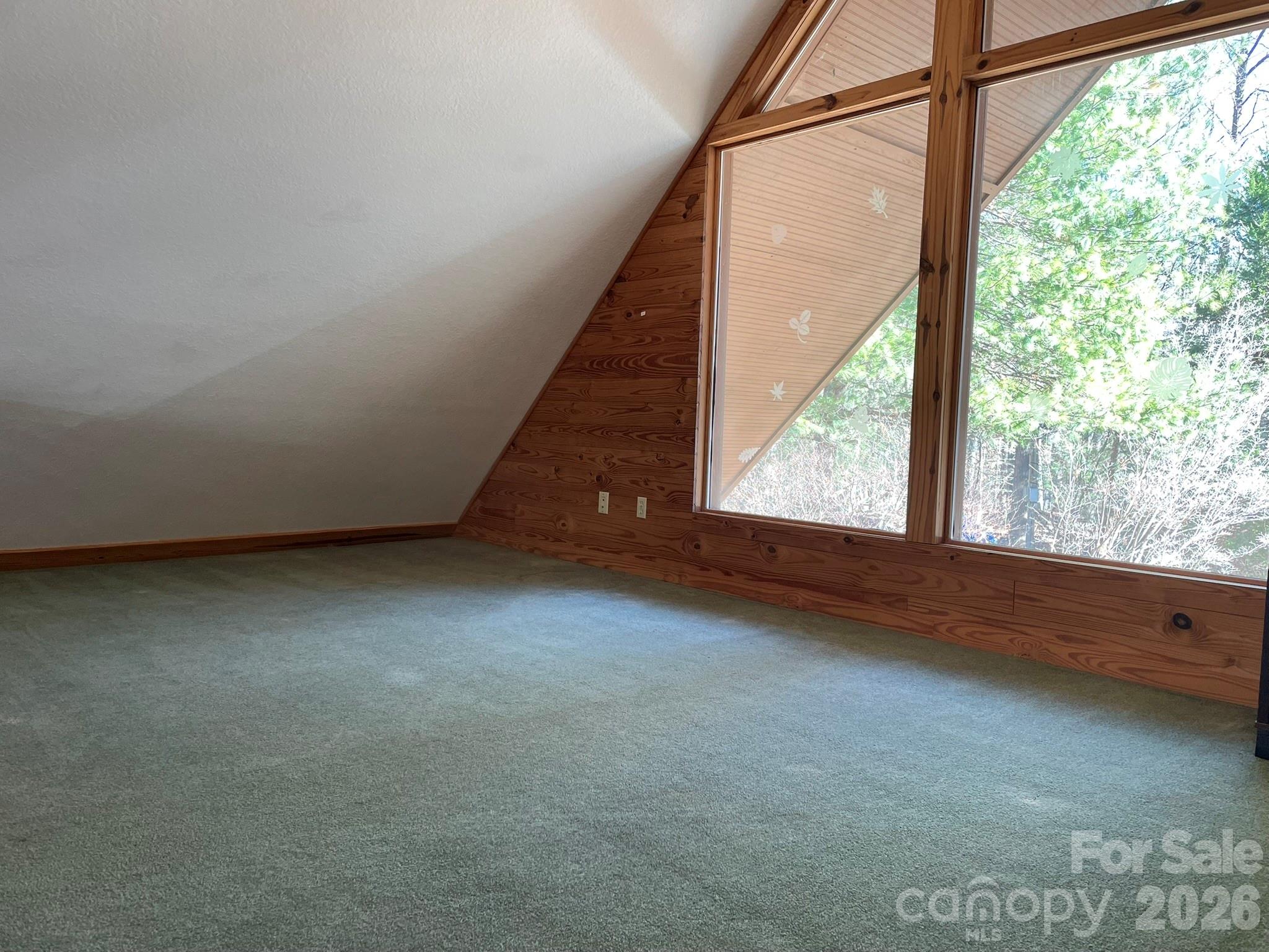 143 Rosewood Lane Rutherfordton, NC 28139 - Photo 21 of 42 an empty room with large windows