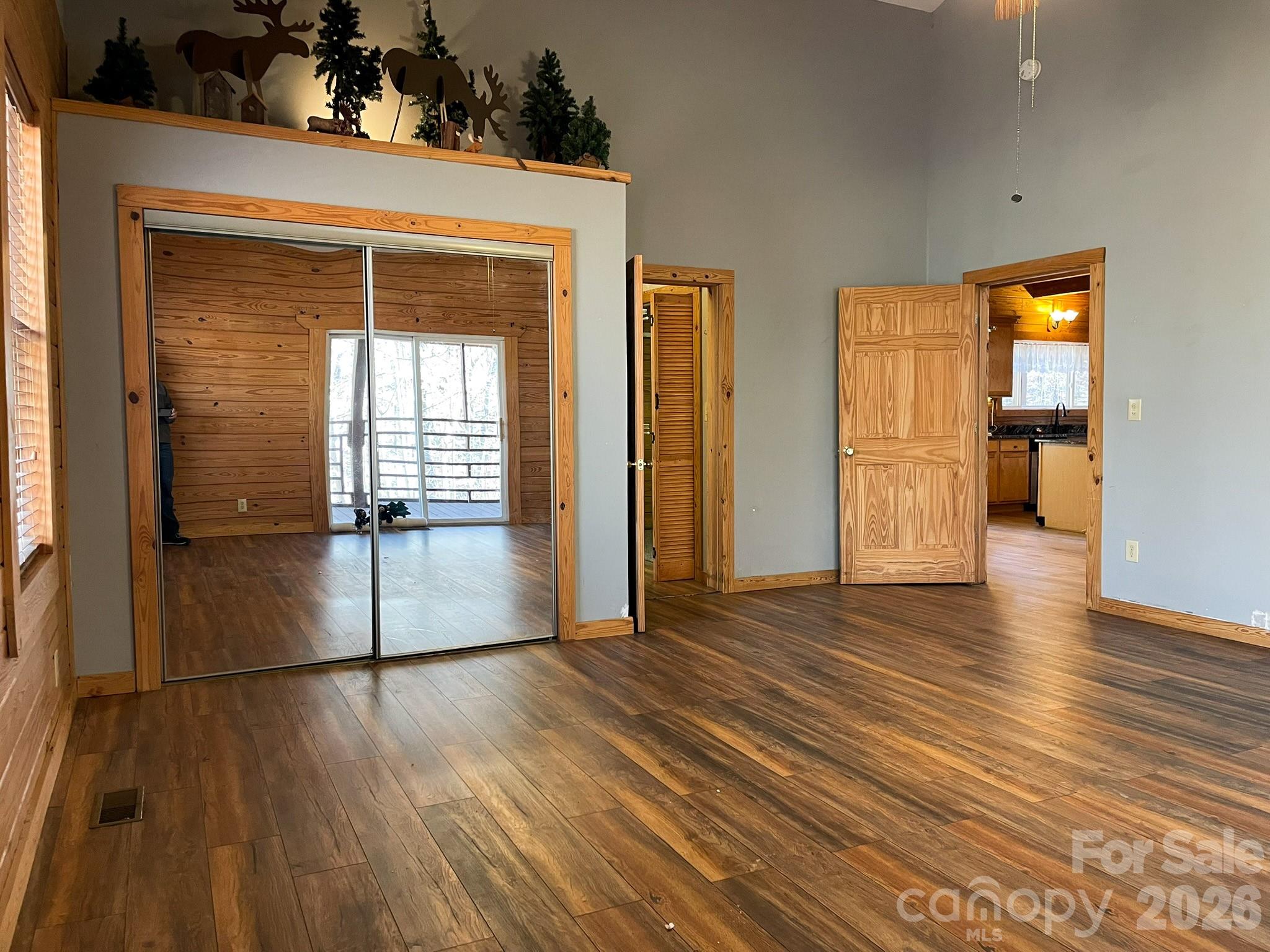 143 Rosewood Lane Rutherfordton, NC 28139 - Photo 28 of 47 a view of empty room with wooden floor and fan