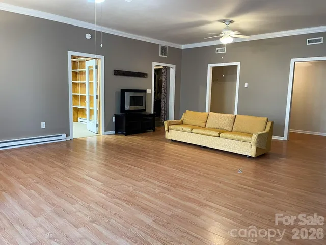 a bedroom with a bed and a walk in closet
