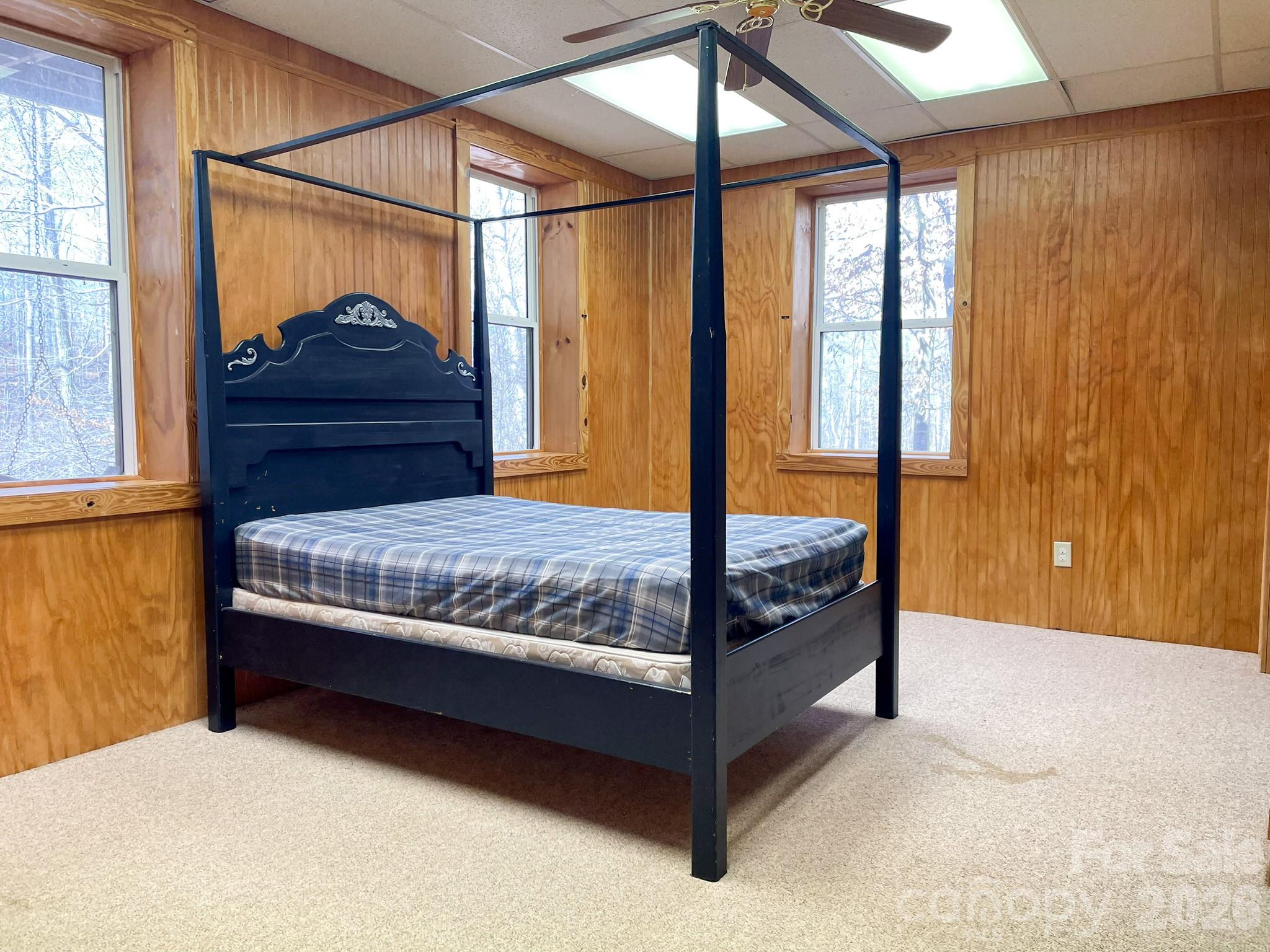143 Rosewood Lane Rutherfordton, NC 28139 - Photo 38 of 47 a bedroom with a bed and window