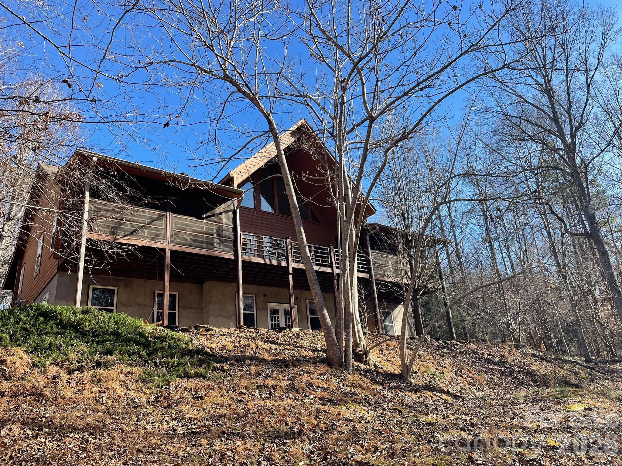 143 Rosewood Lane Rutherfordton, NC 28139 - Photo 42 of 42 a view of a house with a yard and wooden fence