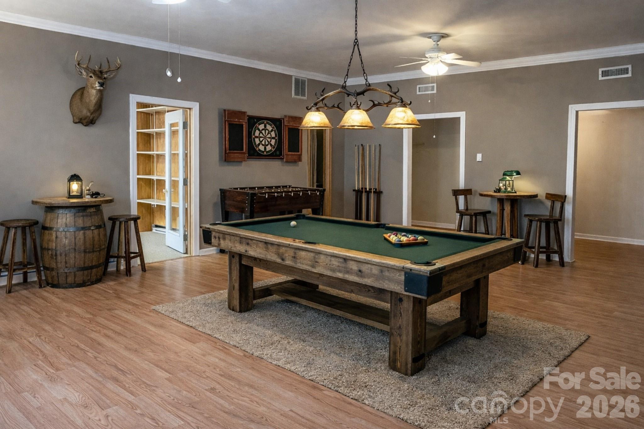 143 Rosewood Lane Rutherfordton, NC 28139 - Photo 6 of 47 a living room with furniture a dining table and a chandelier