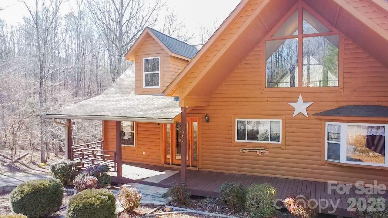 143 Rosewood Lane Rutherfordton, NC 28139 - Photo 8 of 47 a front view of a house with a yard