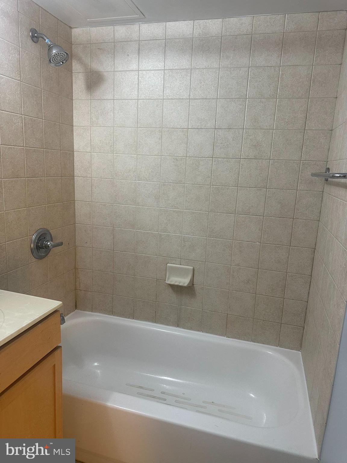 800 4th Street Southwest, Unit S325 Washington, DC 20024 - Photo 12 of 17 a bathroom with a shower and a bath tub