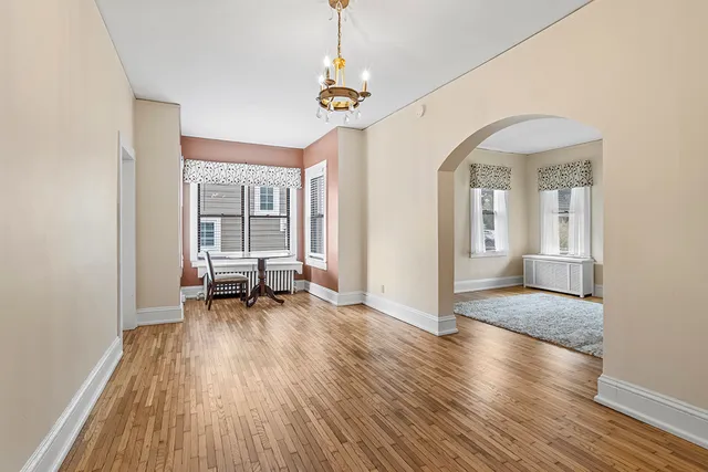 a view of livingroom with hardwood floor and a ceiling fan