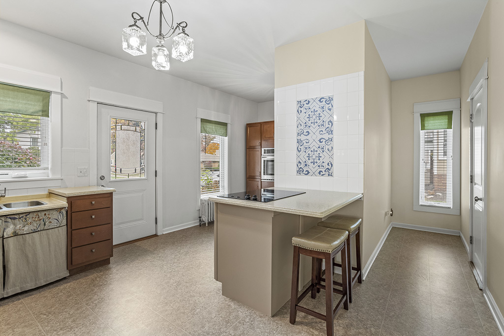 717 Warner Avenue Lemont, IL 60439 - Photo 17 of 29 a view of a kitchen counter space and windows