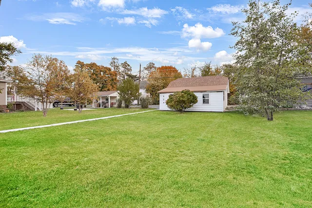 a view of a field with tree s
