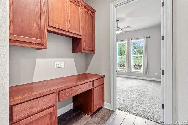 a large bathroom with a tub sink shower double vanity and mirror