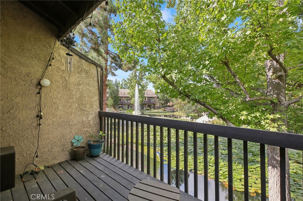 7890 East Spring Street, Unit 16P Long Beach, CA 90815 - Photo 20 of 25 a view of a balcony with wooden floor