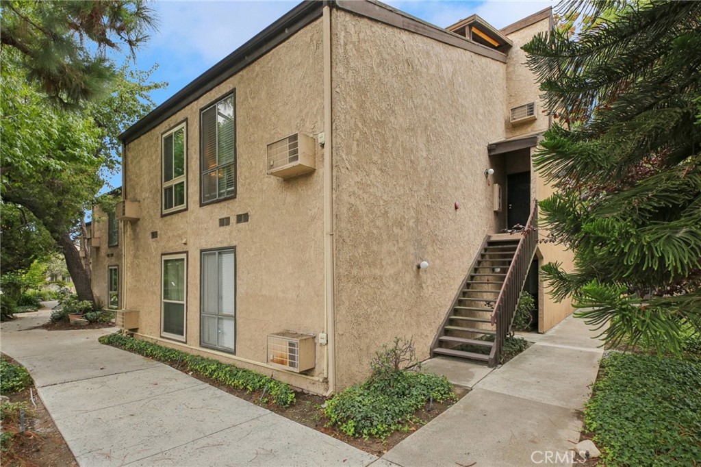 7890 East Spring Street, Unit 16P Long Beach, CA 90815 - Photo 24 of 25 a view of a back yard of the house