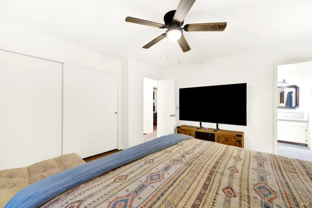 a view of storage and utility room with wooden floor