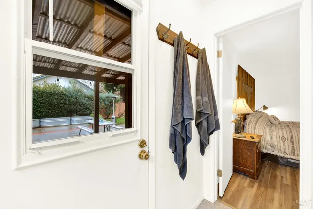 a bedroom with a bed and ceiling fan
