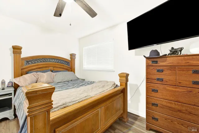 an aerial view of a house with a yard and garden