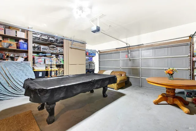 a backyard of a house with portable swimming pool and outdoor seating