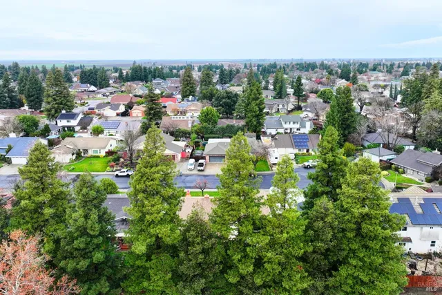 a front view of house with yard and porch