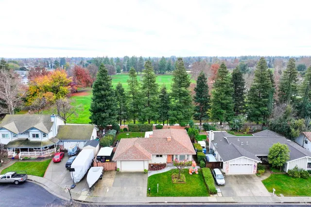 an aerial view of a house with a garden