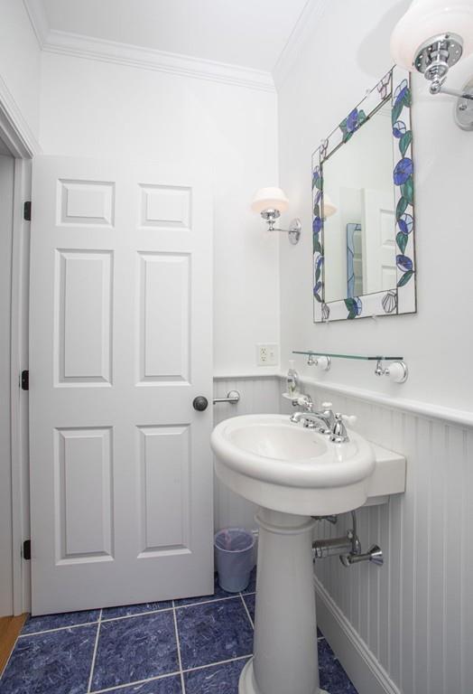 922 Drift Road Westport, MA 02790 - Photo 18 of 42 a bathroom with a sink and a mirror