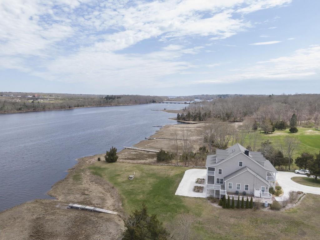 922 Drift Road Westport, MA 02790 - Photo 2 of 42 an aerial view of a house with lake view