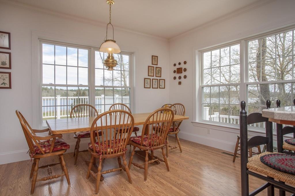 922 Drift Road Westport, MA 02790 - Photo 23 of 42 a view of a dining room with furniture window and outside view