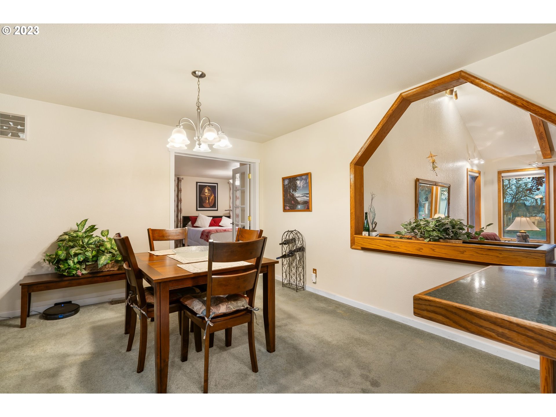 345 3rd Street Northeast Irrigon, OR 97844 - Photo 14 of 39 a view of a dining room with furniture and a chandelier