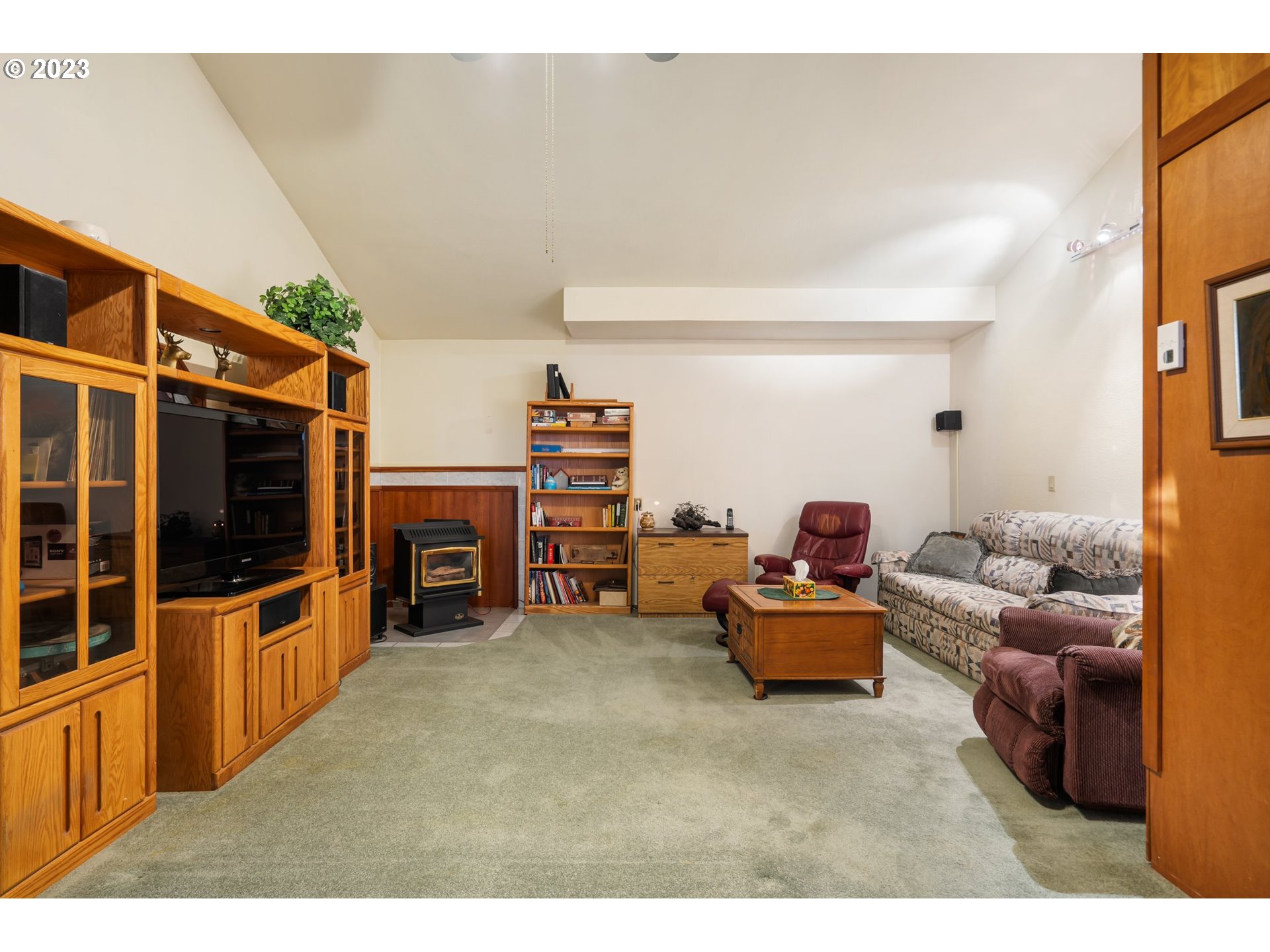 345 3rd Street Northeast Irrigon, OR 97844 - Photo 15 of 39 a living room with furniture and a flat screen tv