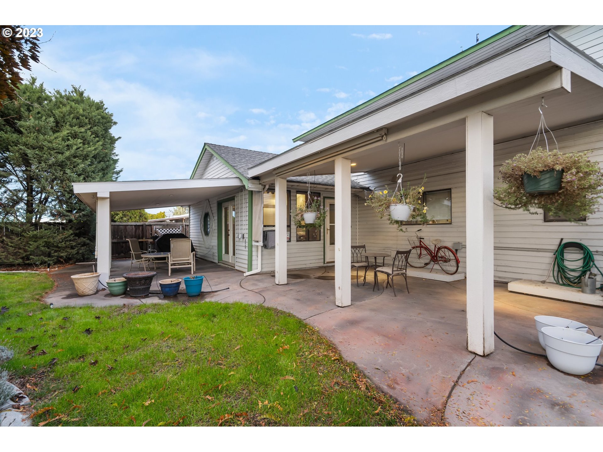 345 3rd Street Northeast Irrigon, OR 97844 - Photo 33 of 39 a view of a house with backyard porch and sitting area