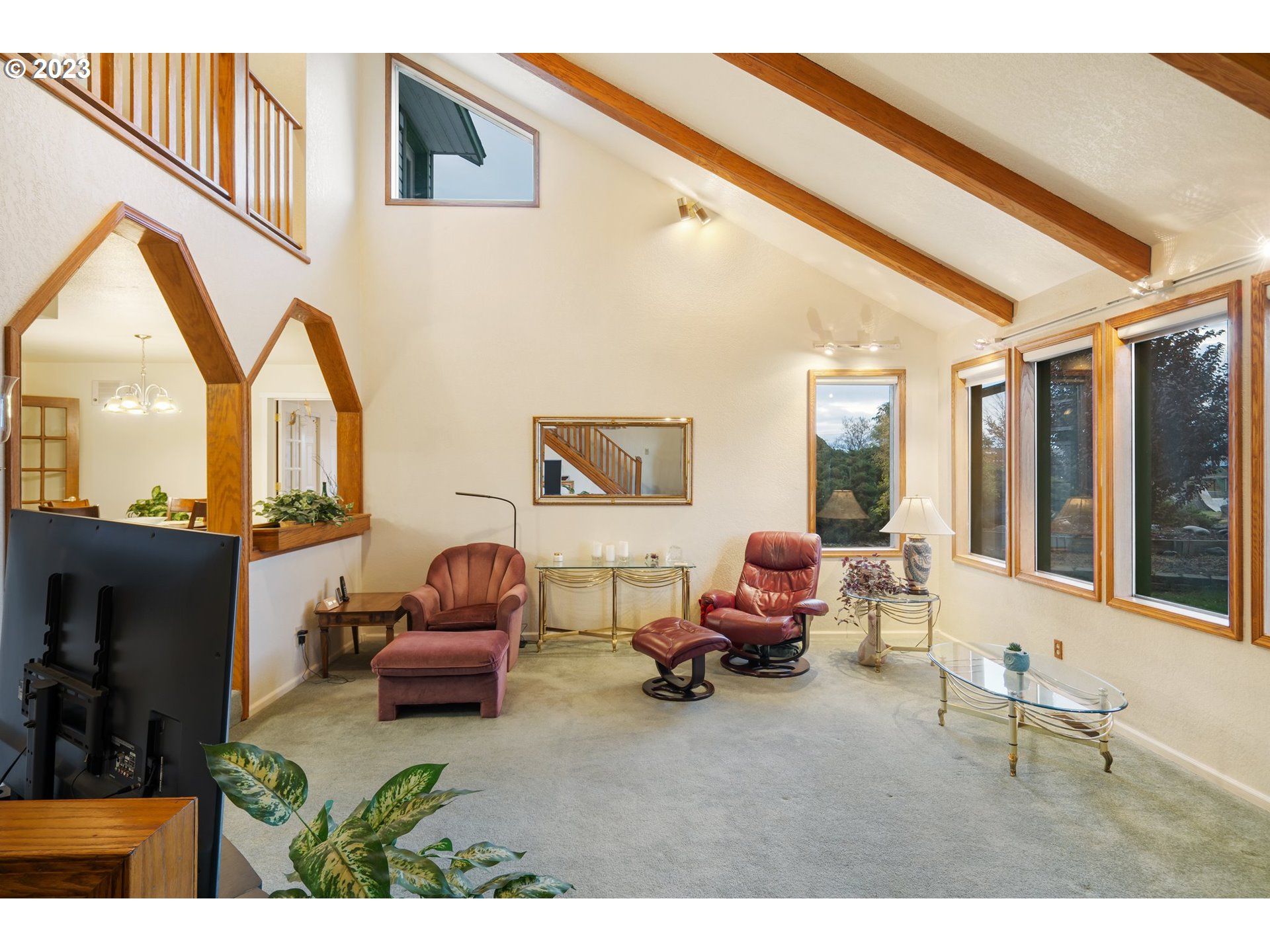345 3rd Street Northeast Irrigon, OR 97844 - Photo 6 of 39 a living room with furniture a fireplace and large windows