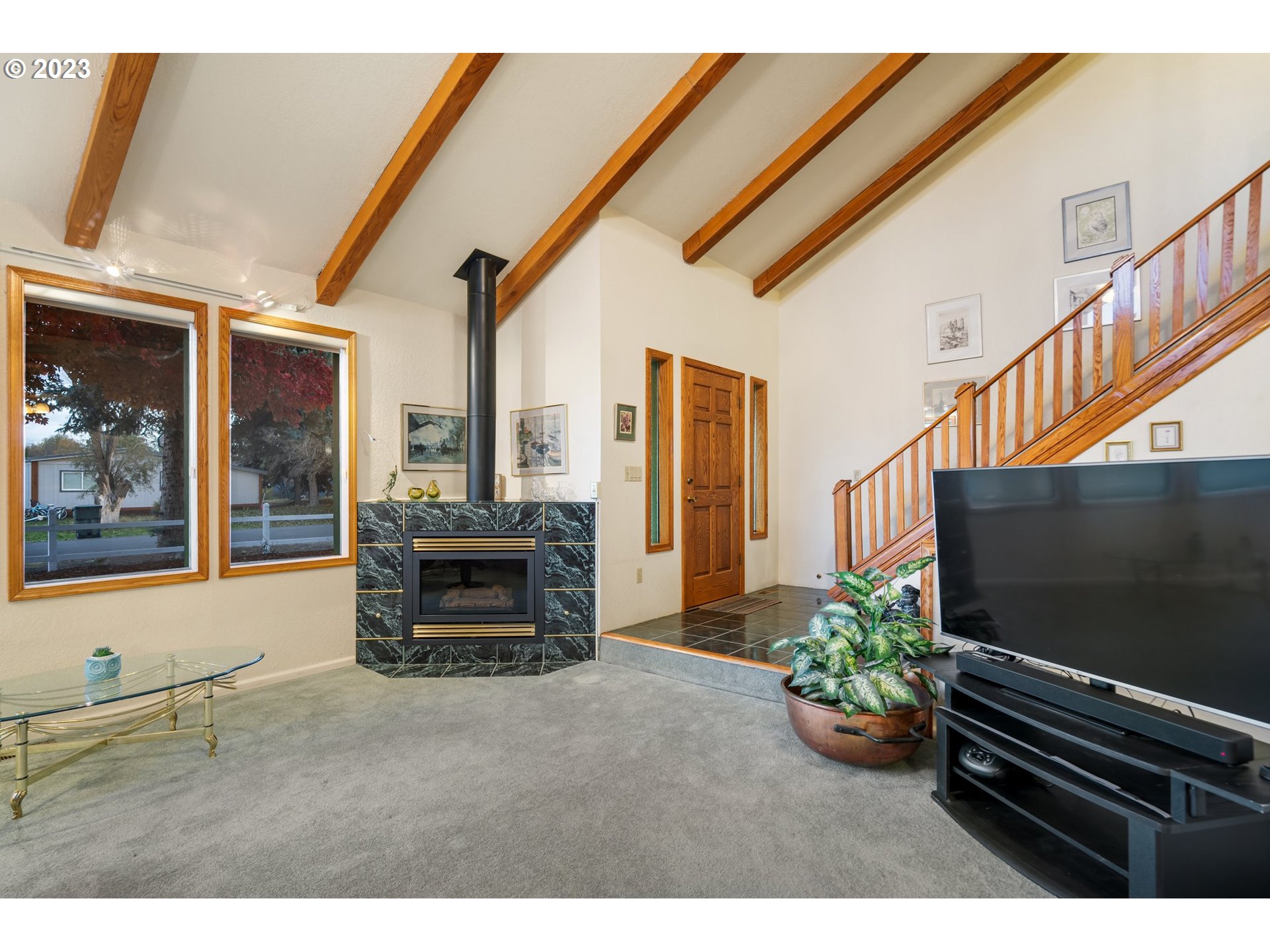 345 3rd Street Northeast Irrigon, OR 97844 - Photo 9 of 39 a living room with furniture and a flat screen tv