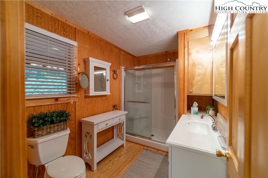 2161 River Bend Road Mouth Of Wilson, VA 24363 - Photo 21 of 47 a bathroom with a sink toilet and shower