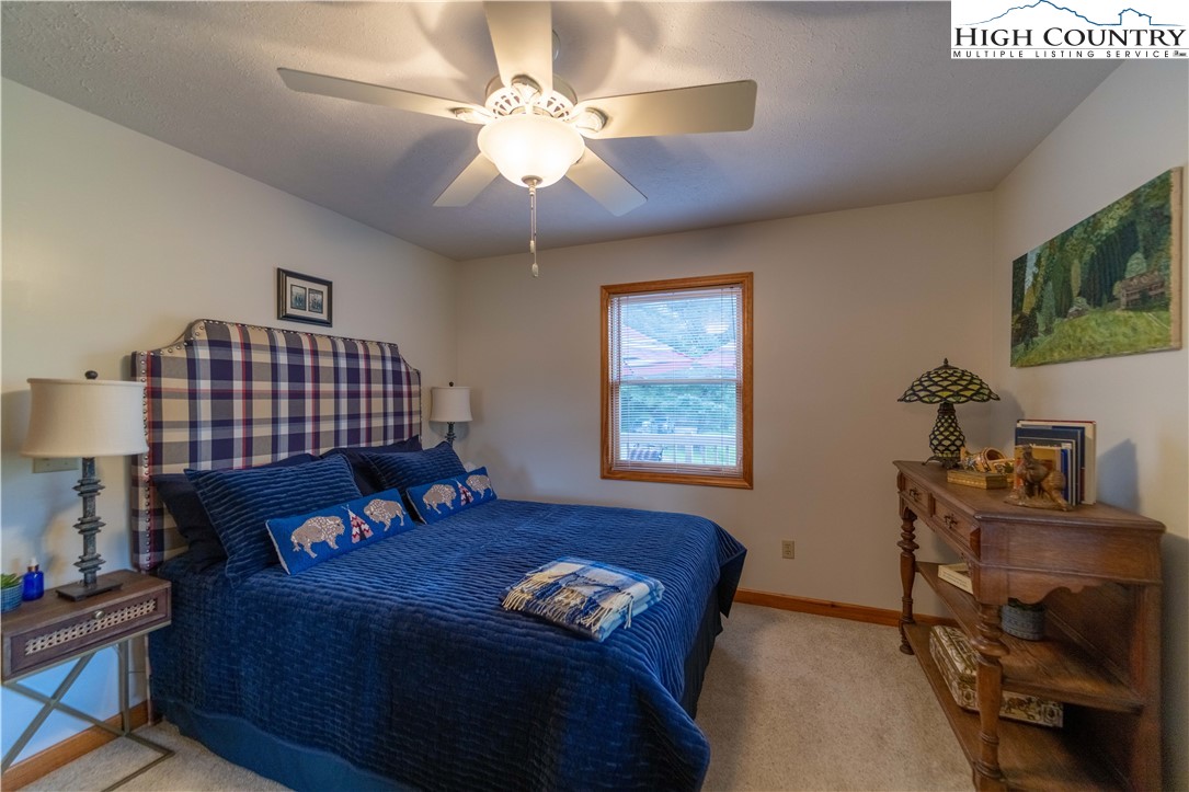 2161 River Bend Road Mouth Of Wilson, VA 24363 - Photo 22 of 47 a living room with furniture and a window