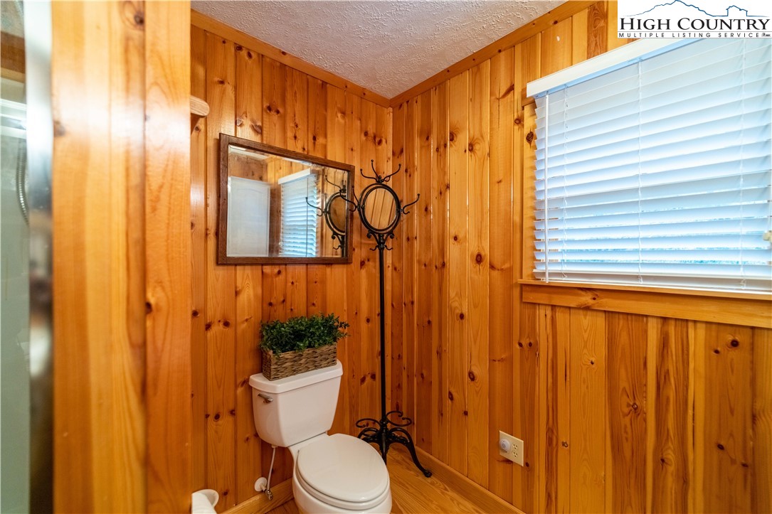 2161 River Bend Road Mouth Of Wilson, VA 24363 - Photo 30 of 47 a bathroom with a shower curtain