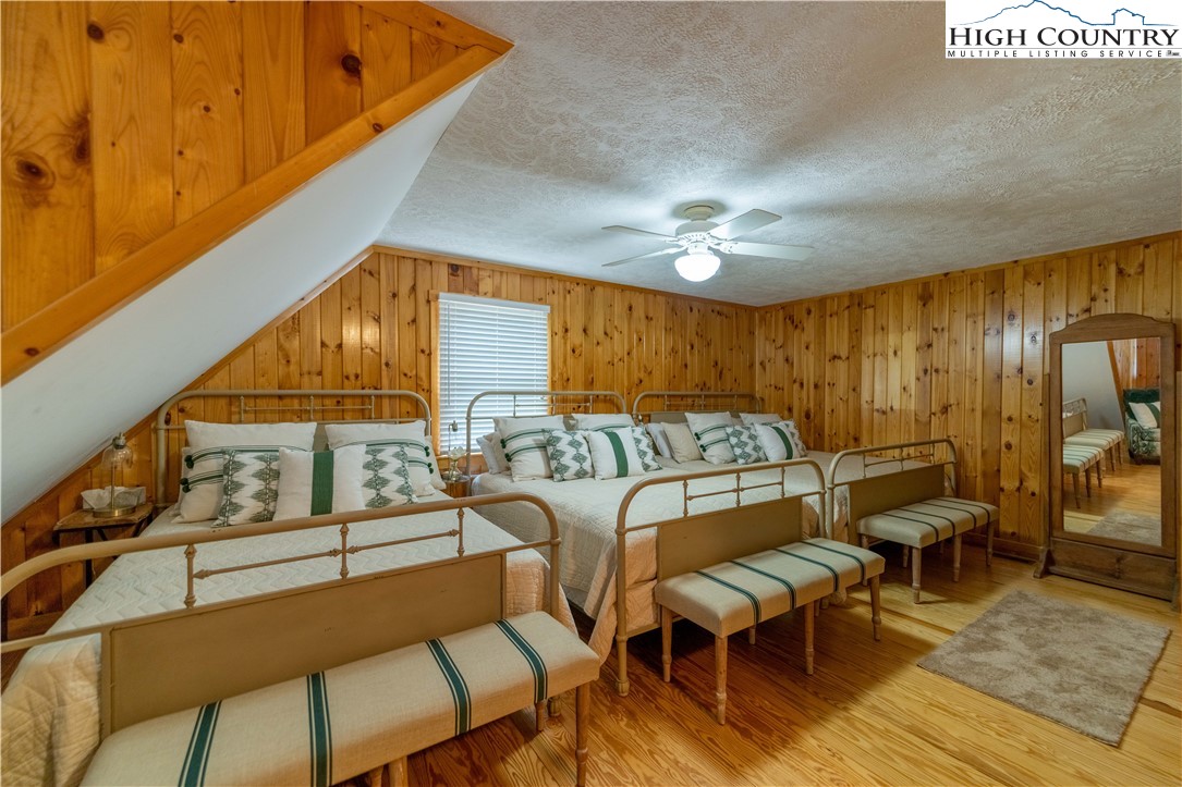 2161 River Bend Road Mouth Of Wilson, VA 24363 - Photo 31 of 47 a living room with furniture a chandelier and a large window