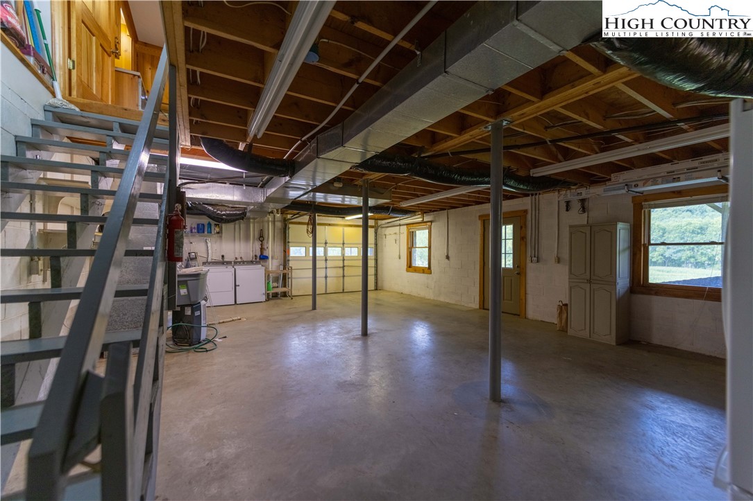 2161 River Bend Road Mouth Of Wilson, VA 24363 - Photo 34 of 47 a view of empty room with wooden floor and fan